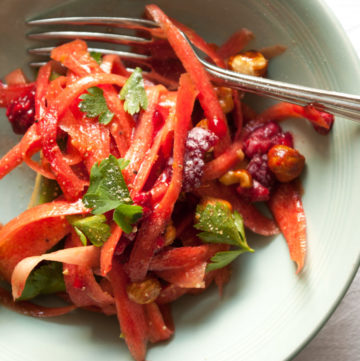 Carrot Salad with Avocado and Raspberry – A sweet/savoury salad recipe with shavings of carrot, creamy avocado and fruity raspberries. Tossed with a tangy balsamic and quince salad dressing. A healthy, colourful appetizer or side salad. By @deliciouscratch | deliciousfromscratch.com