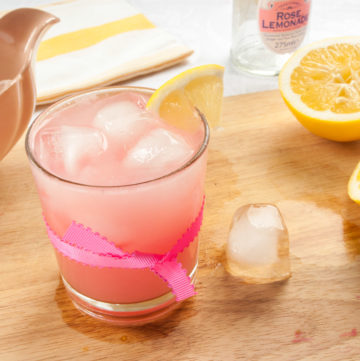 Rhubarb Cocktail with Lemon and Rose – A tart, fruity, lightly sweet cocktail recipe, with puréed pink rhubarb, rose lemonade and fresh lemon juice. A bright, colourful winter/spring cocktail. By @deliciouscratch | deliciousfromscratch.com