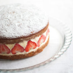Victoria Sandwich Cake with Strawberries – A classic English cake recipe, here with whipped cream, fresh strawberries and camomile. A gorgeous summer dessert recipe. By @deliciouscratch | deliciousfromscratch.com