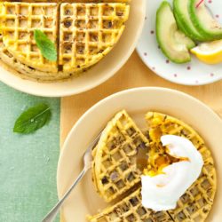 Halloumi onion bhaji waffles recipe from How to Cook Halloumi cookbook by Nancy Anne Harbord. Super easy breakfast waffles with chickpea flour, fresh onion and cumin. Serve with poached eggs and avocado for a healthy brunch. By @deliciouscratch | deliciousfromscratch.com