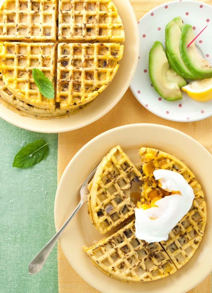 Halloumi onion bhaji waffles recipe from How to Cook Halloumi cookbook by Nancy Anne Harbord. Super easy breakfast waffles with chickpea flour, fresh onion and cumin. Serve with poached eggs and avocado for a healthy brunch. By @deliciouscratch | deliciousfromscratch.com