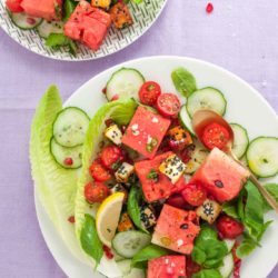 Halloumi watermelon salad recipe from How to Cook Halloumi cookbook by Nancy Anne Harbord. Toasted halloumi coated in seeds with pomegranate, mint and tomato. A bright, halthy halloumi salad absolutely packed with flavour. By @deliciouscratch | deliciousfromscratch.com