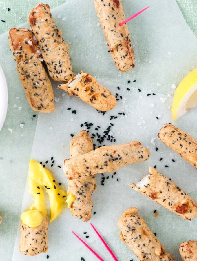 Halloumi fries recipe with garlic mayonnaise dip from How to Cook Halloumi cookbook by Nancy Anne Harbord. Deep fried halloumi with a crispy nigella seed batter – dip in homemade garlic mayonnaise for sensational party snacks! By @deliciouscratch | deliciousfromscratch.com