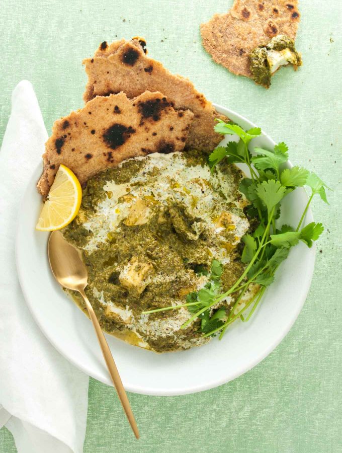 Palak halloumi (Indian spinach halloumi curry) recipe from How to Cook Halloumi cookbook by Nancy Anne Harbord. Indian food and halloumi are made to be together! Try it in this creamy spinach curry simmered with chunks of salty halloumi. By @deliciouscratch | deliciousfromscratch.com
