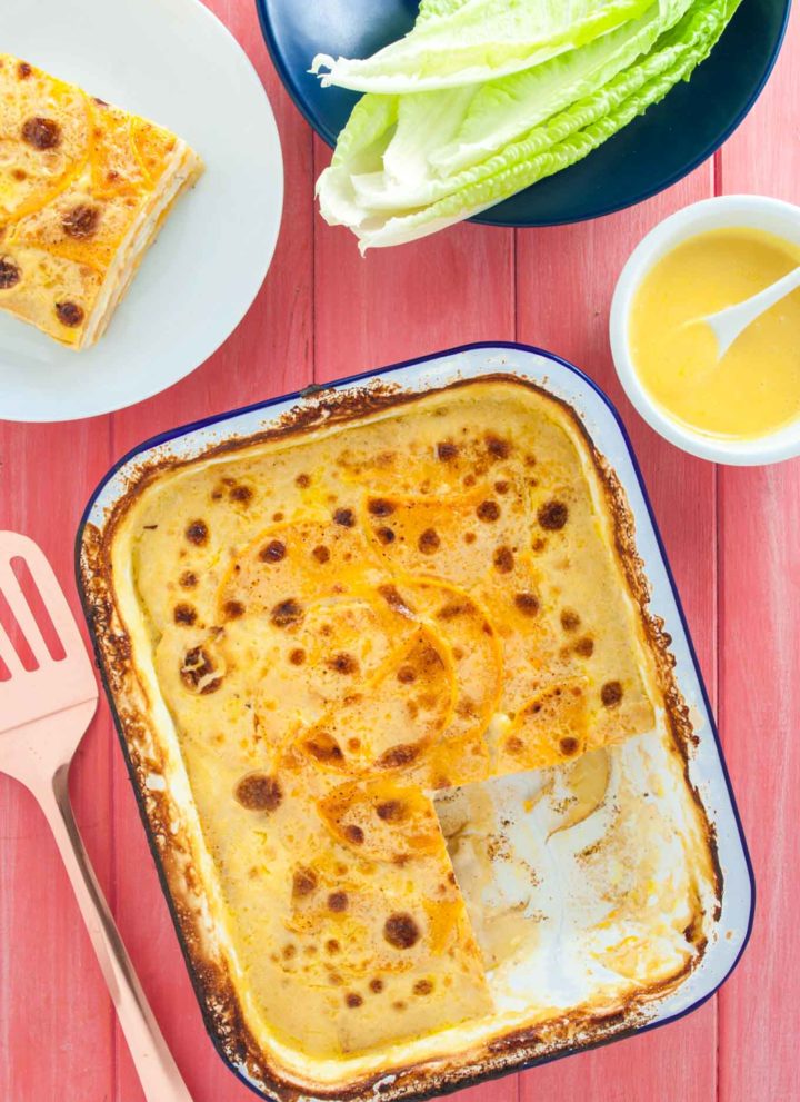 Potato, pumpkin and halloumi gratin recipe from How to Cook Halloumi cookbook by Nancy Anne Harbord. A luxurious gratin recipe with colourful layers of sweet orange pumpkin, salty white halloumi and potato, baked in cream and vegetable stock. By @deliciouscratch | deliciousfromscratch.com