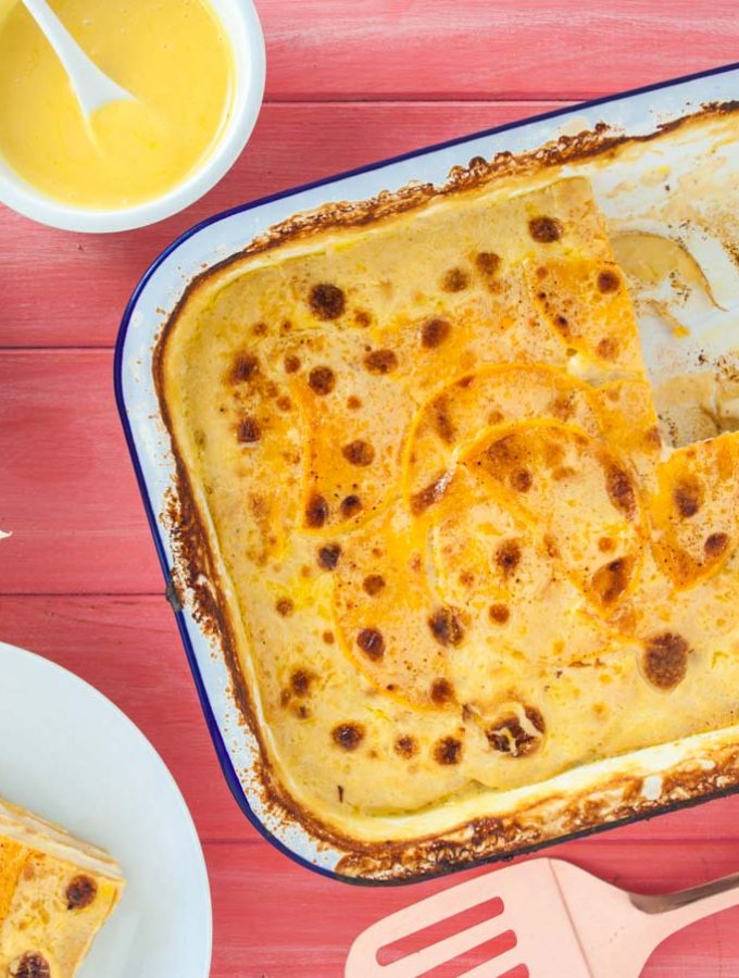 Potato, pumpkin and halloumi gratin recipe from How to Cook Halloumi cookbook by Nancy Anne Harbord. A luxurious gratin recipe with colourful layers of sweet orange pumpkin, salty white halloumi and potato, baked in cream and vegetable stock. By @deliciouscratch | deliciousfromscratch.com
