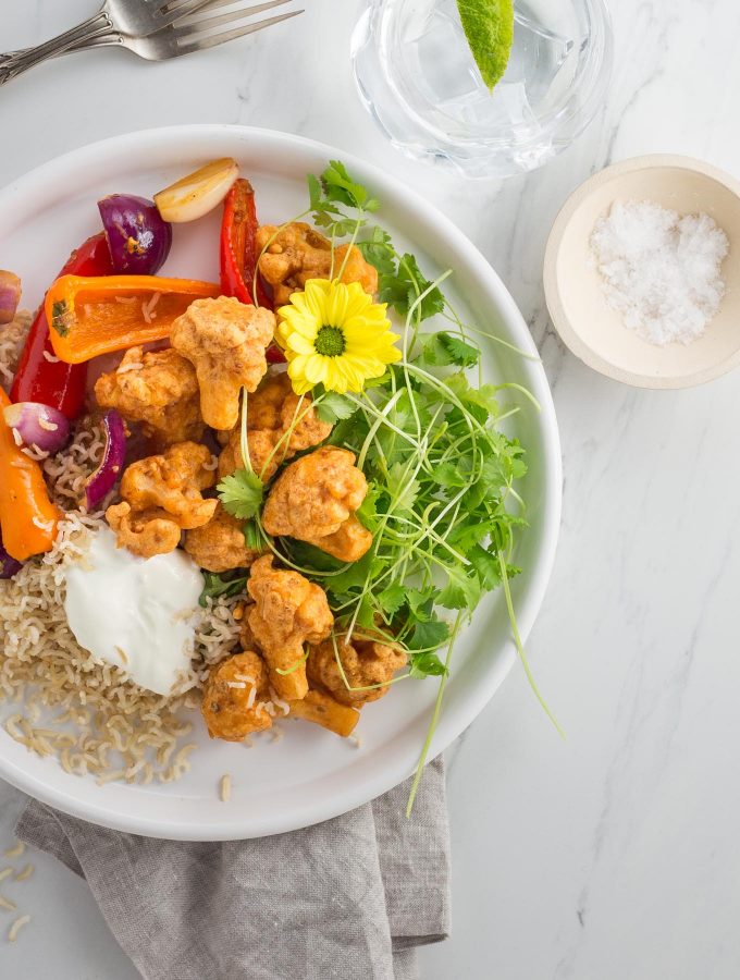 Spicy Indo-Chinese battered cauliflower with garlicky vegetables and brown rice recipe