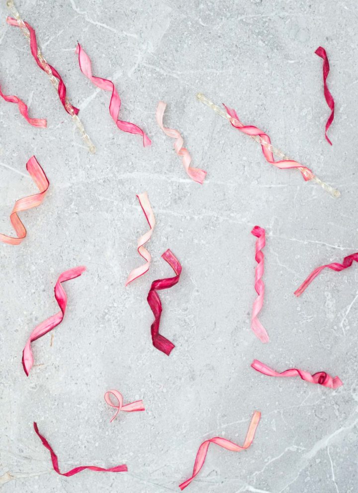 A simple, strikingly beautiful rhubarb garnish for cakes, desserts and cocktails. Just soak strips of rhubarb in sugar syrup and dry out in the oven.