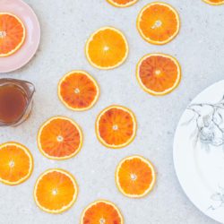 Candied blood orange slices recipe – a beautiful garnish for cakes and desserts.