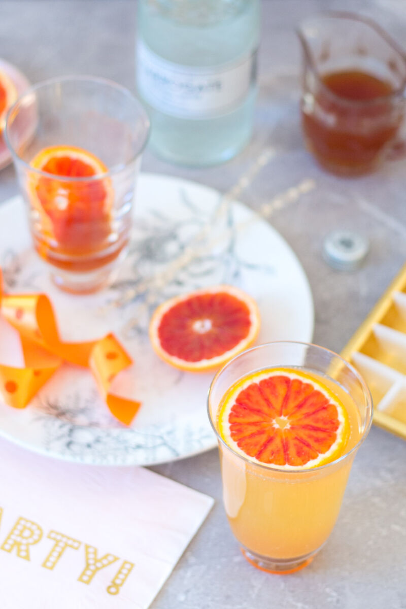 Blood orangeade recipe – an incredibly flavoured orange syrup, topped up with sparkling water. A lovely spring and summer drink.