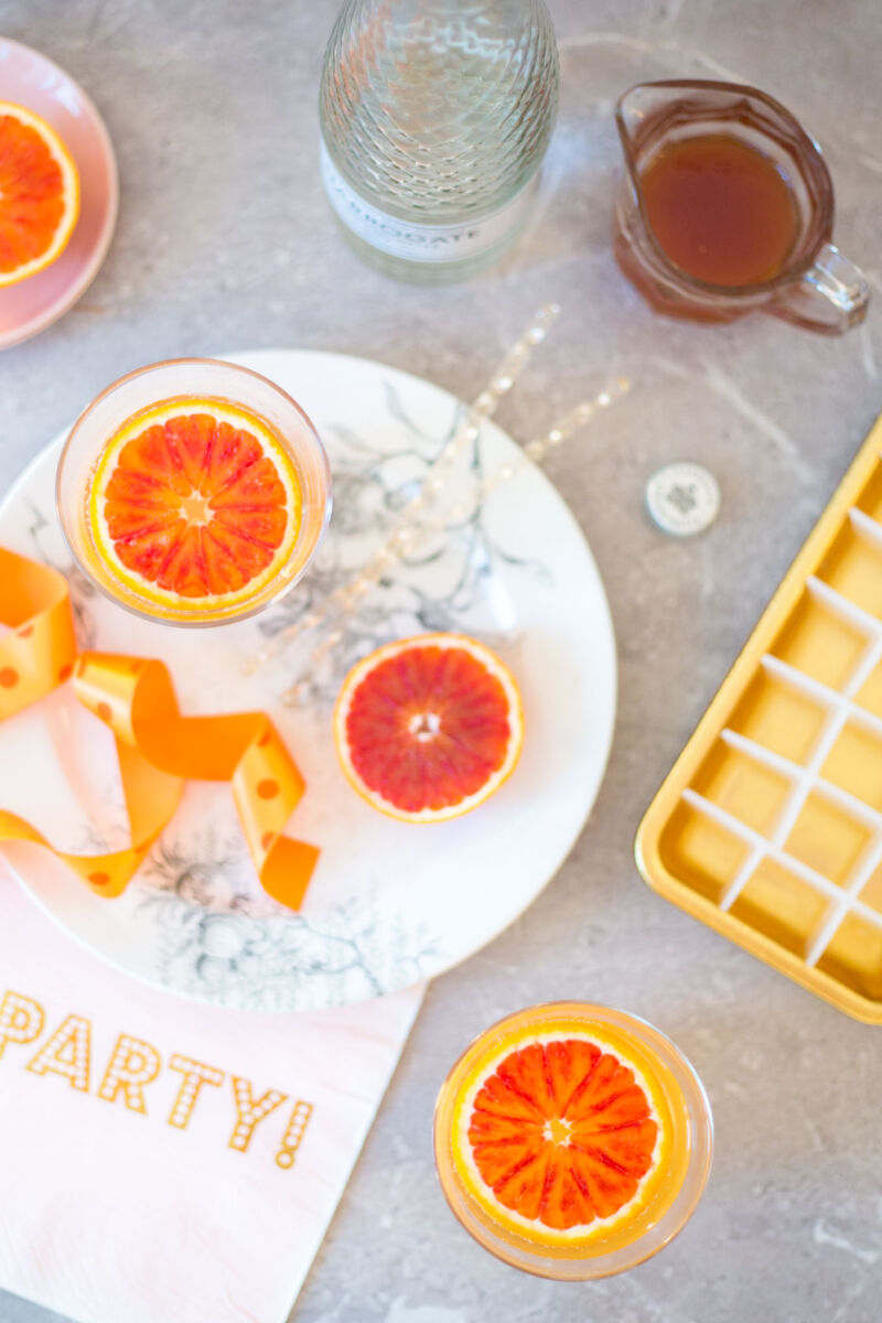 Blood orangeade recipe – an incredibly flavoured orange syrup, topped up with sparkling water. A lovely spring and summer drink.
