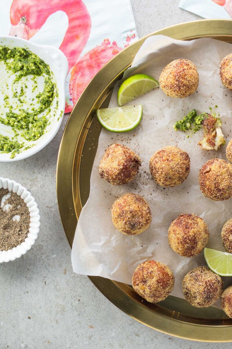 Crispy, creamy, beautifully seasoned potato cheese fritters, packed with halloumi, garlic, green chilli and lime. Zingy coriander pesto to dip.
